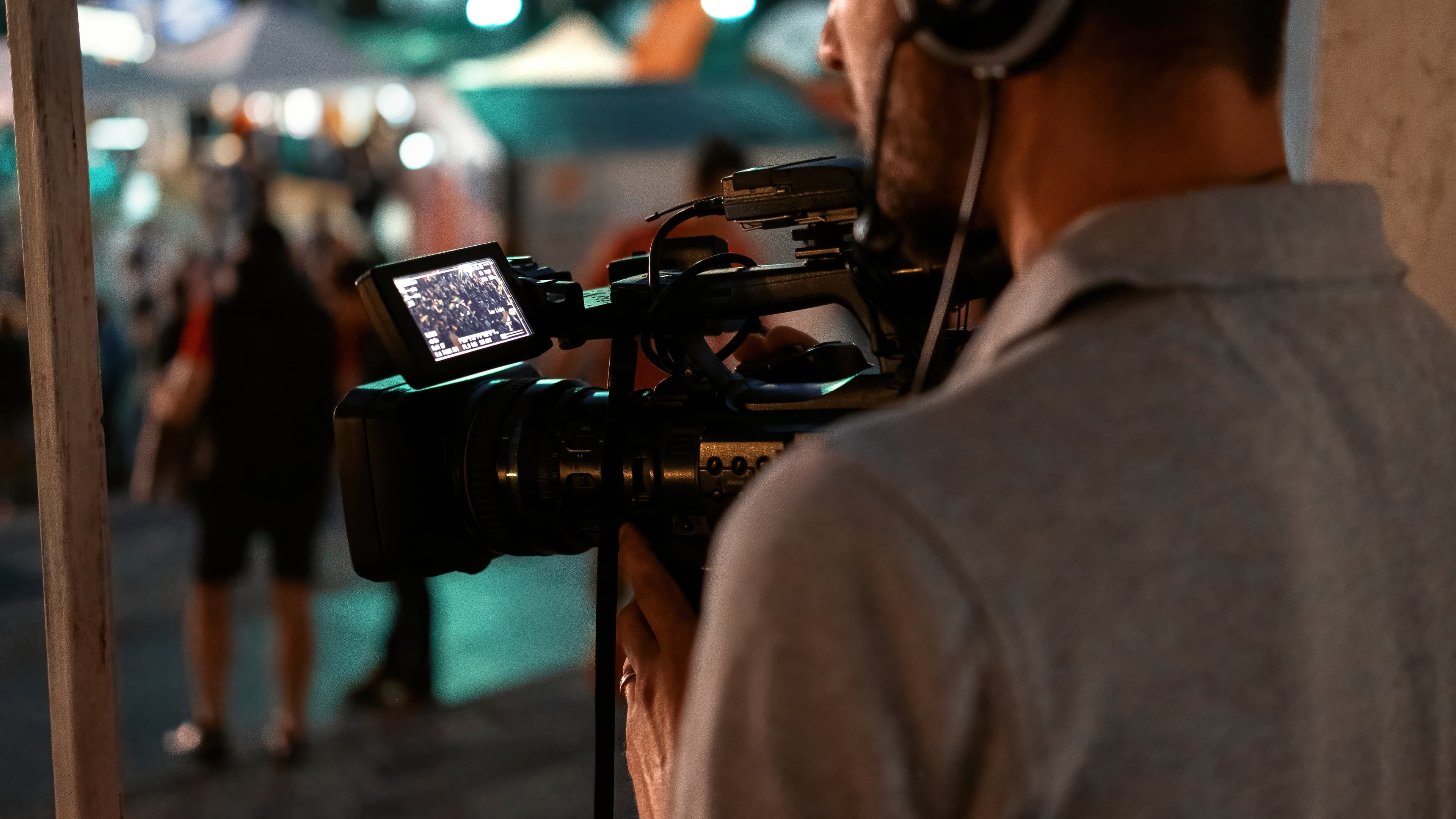 Suho Studio hero background — camera filming